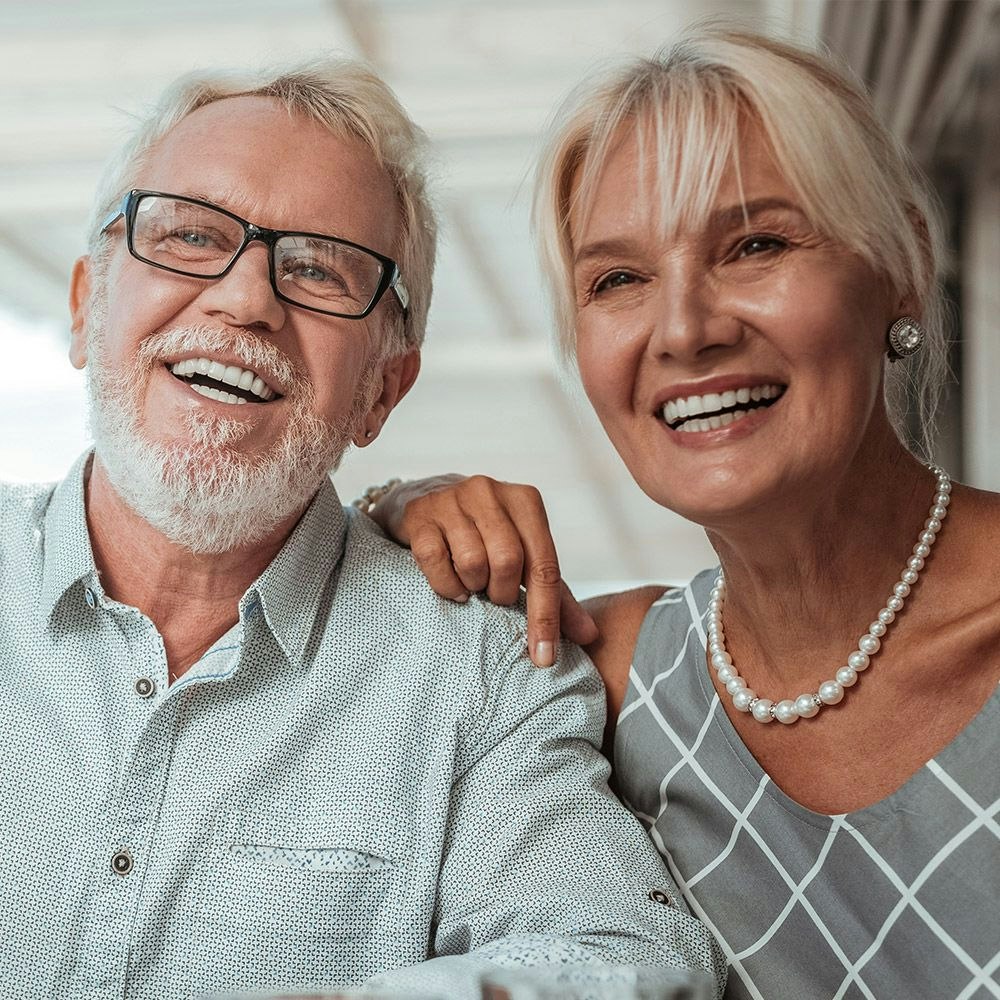 Older man and woman smiling
