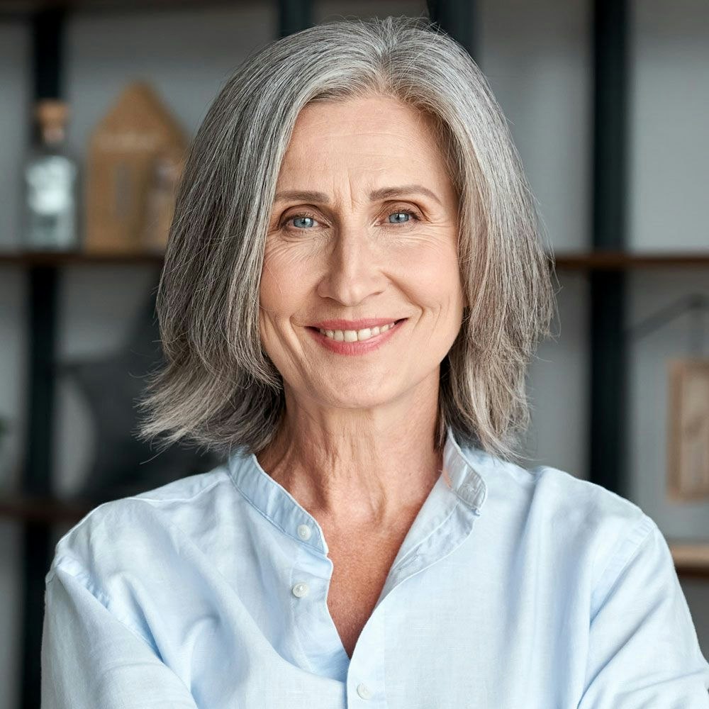 Older business woman smiling