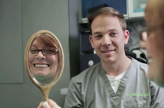 Smiling dental patient with Dr. Jason Hecht