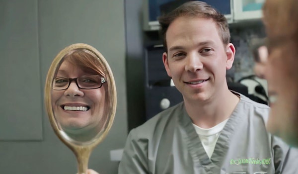 Smiling dental patient with Dr. Jason Hecht