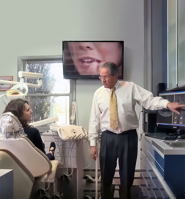 Dr. Hecht educating a patient during a consultation