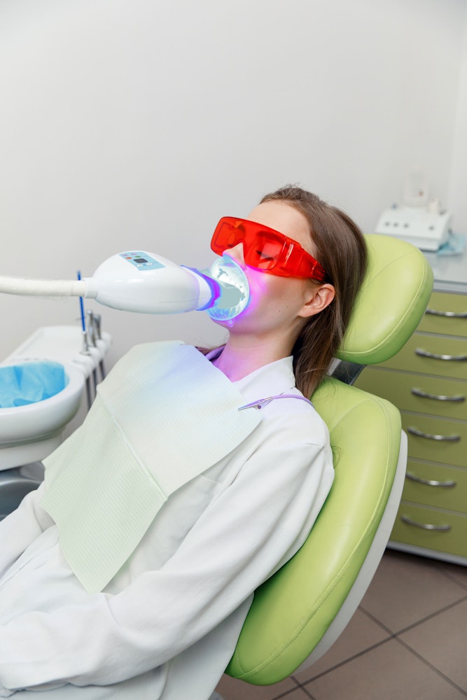 woman having her teeth whitened