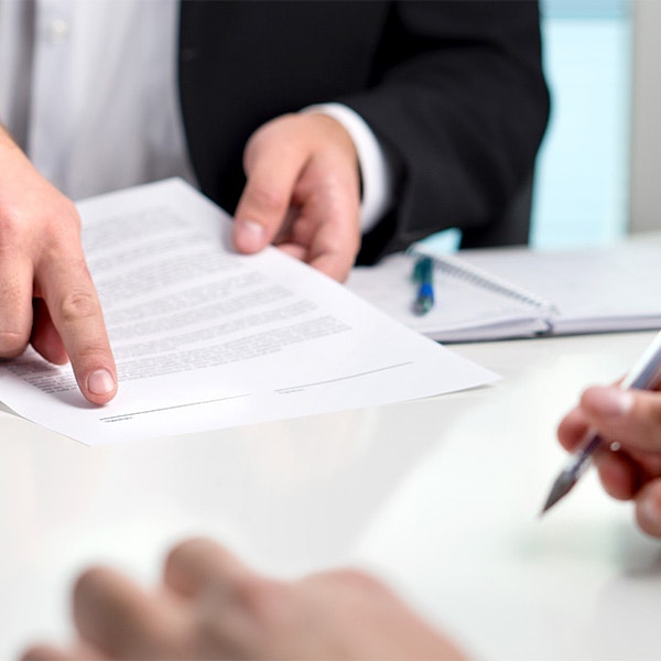 Man pointing to document