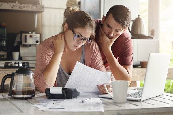Couple reviewing paperwork