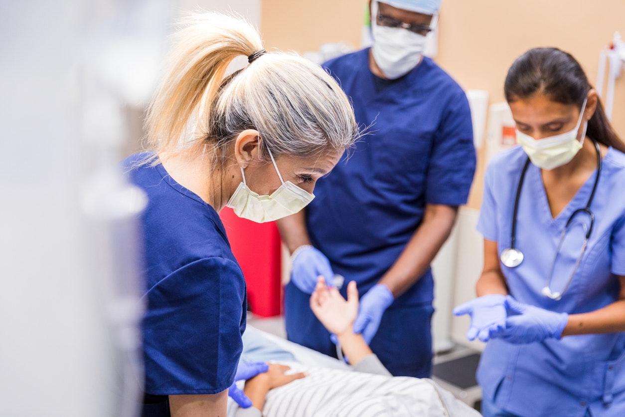 medical team caring for patient