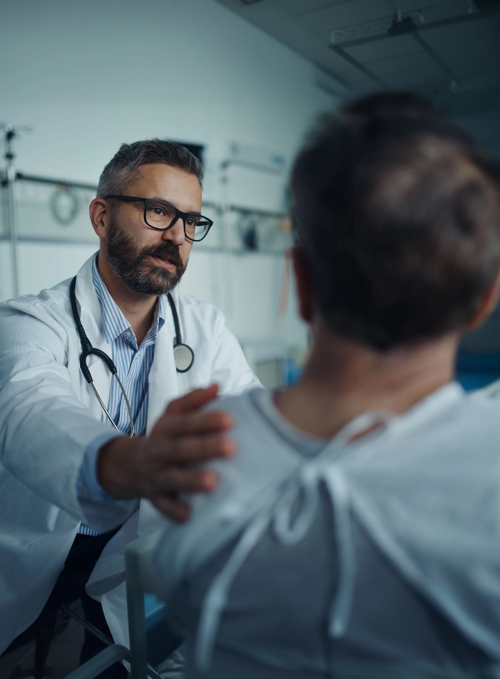 Doctor speaking with patient