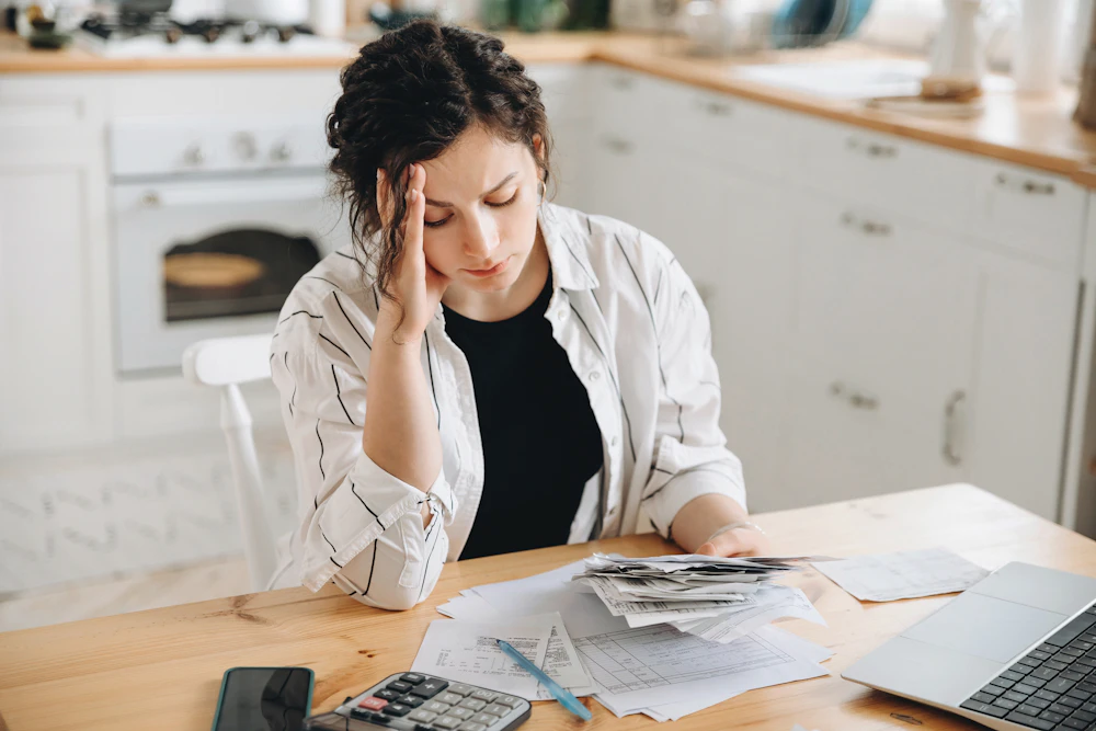 woman holding medical bills