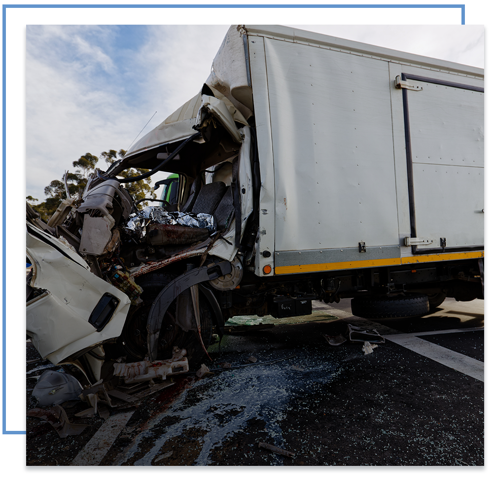 Semi-truck on its side