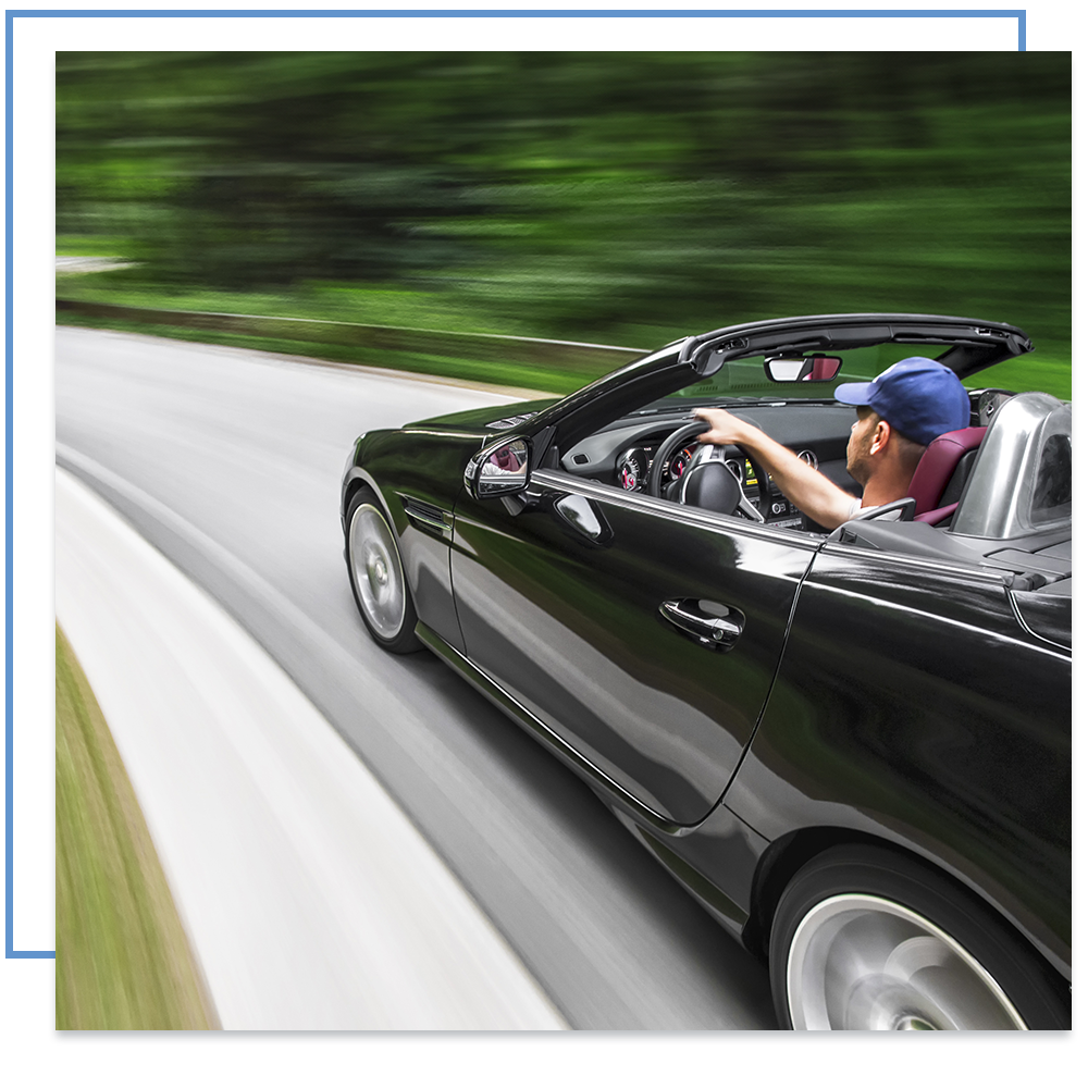 Man speeding in sports car