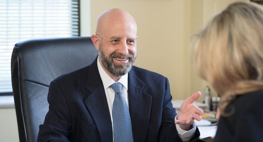 Dr. Hove talking with patient