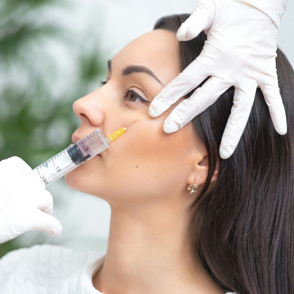 Woman getting botox injection