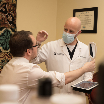 Dr. Hove speaks to patient