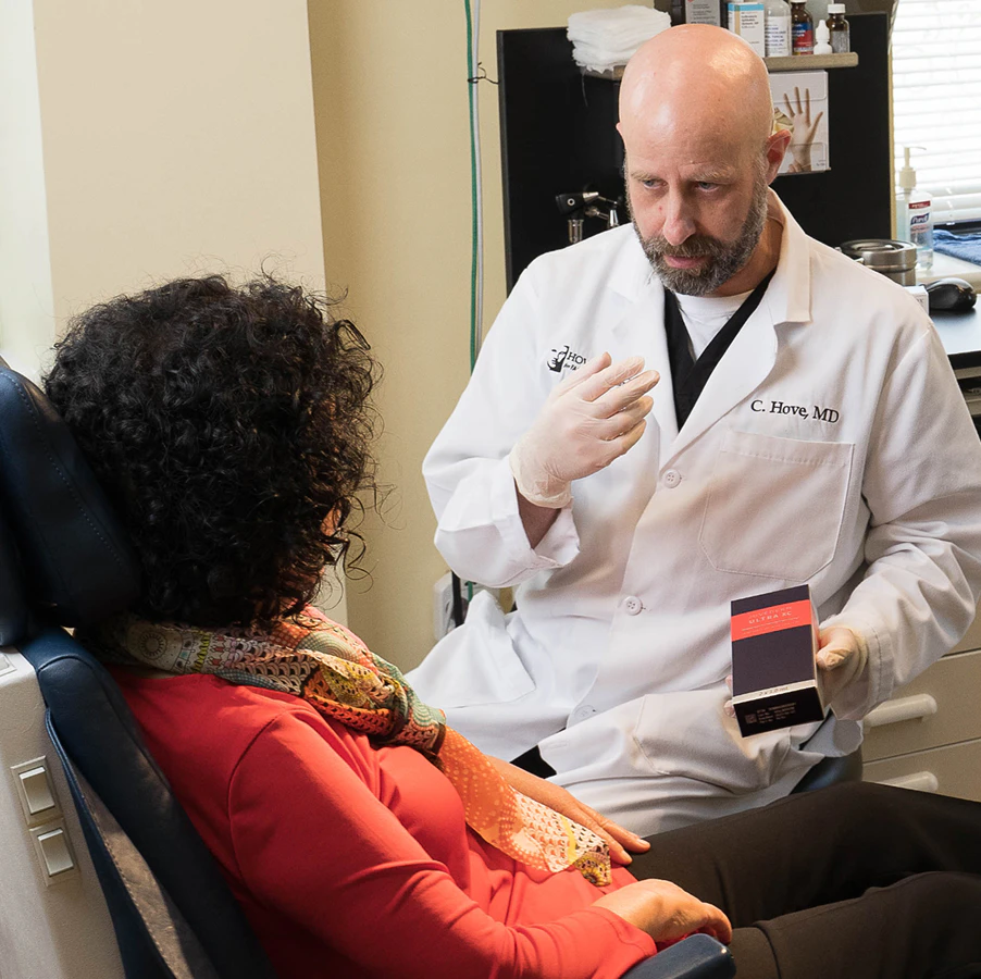 Dr. Hove speaks to a patient