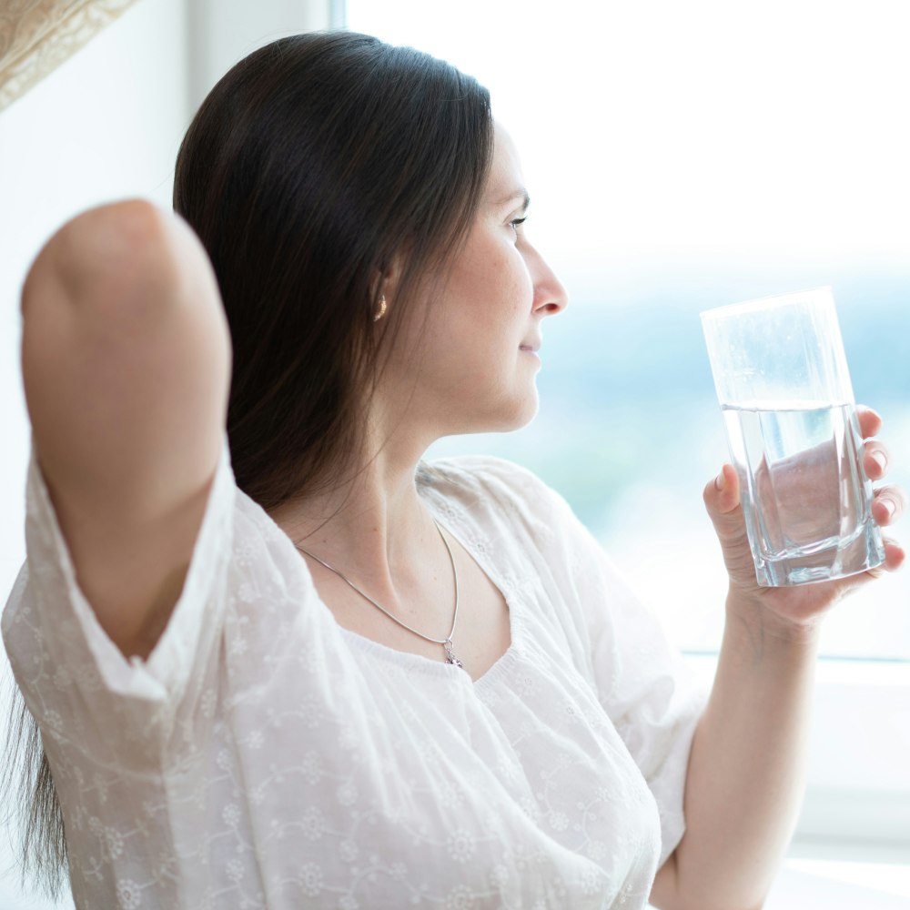 Woman drinking glass of water