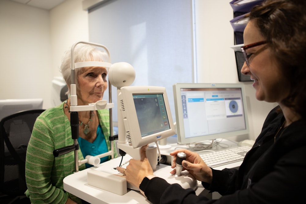 Older woman having advanced optical imaging done