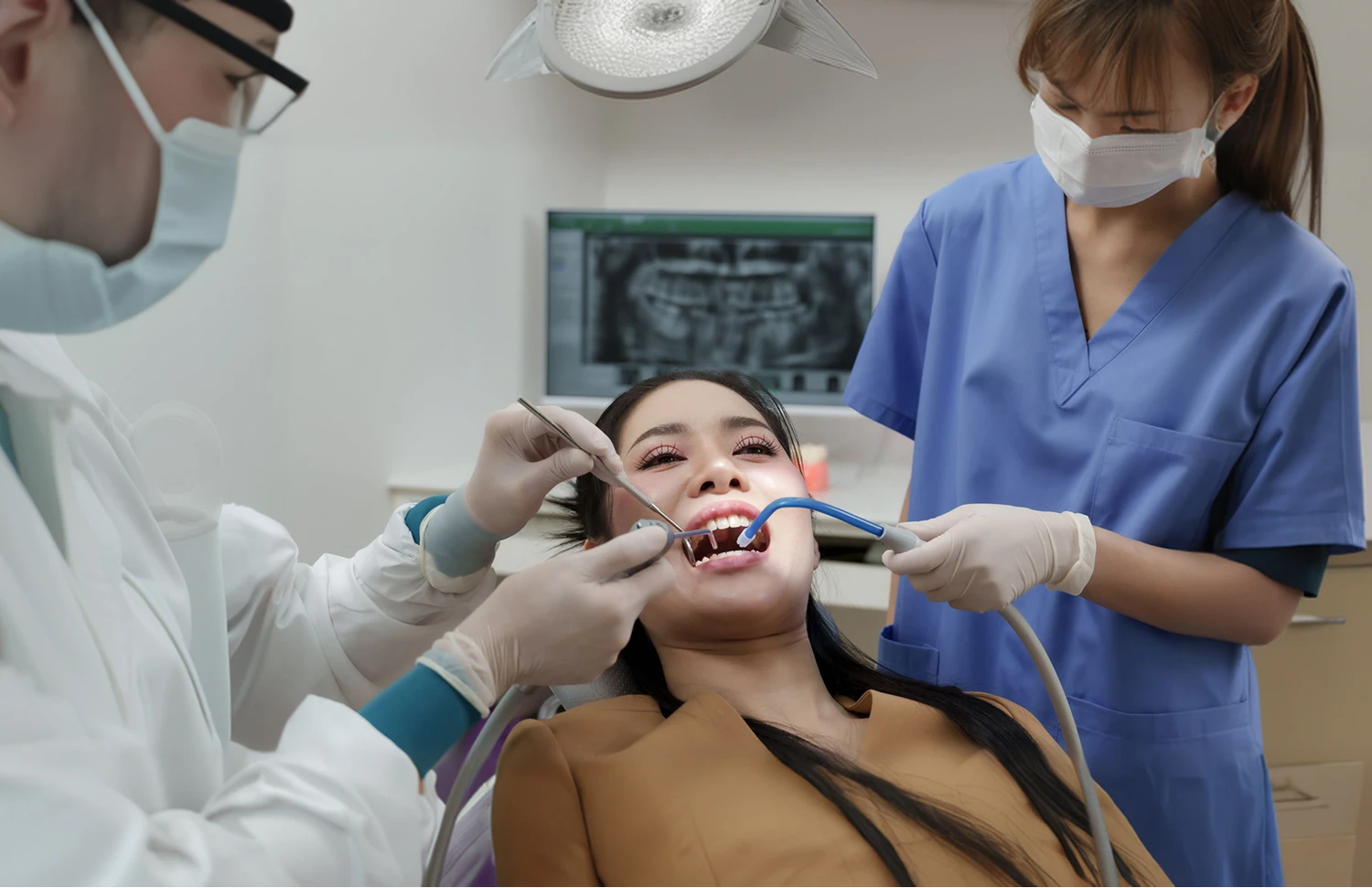 woman getting a dental cleaning