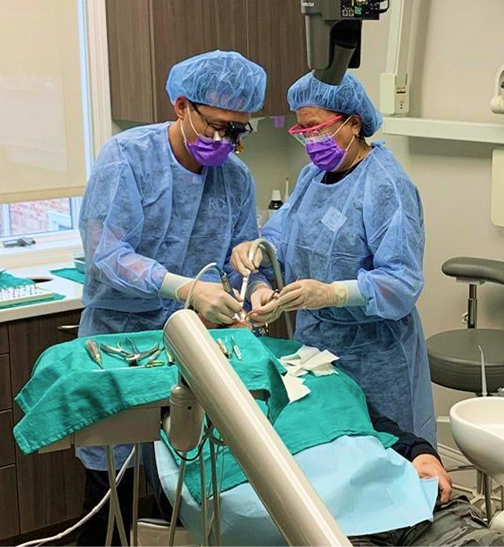 Dr. Joung and his dental assistant