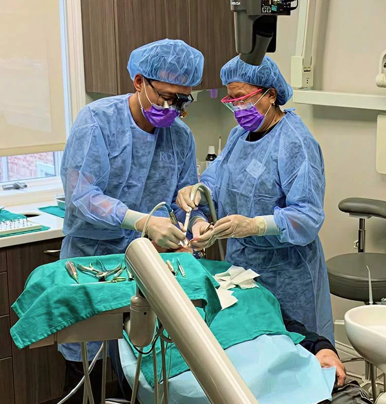 Dr. Joung and his dental assistant