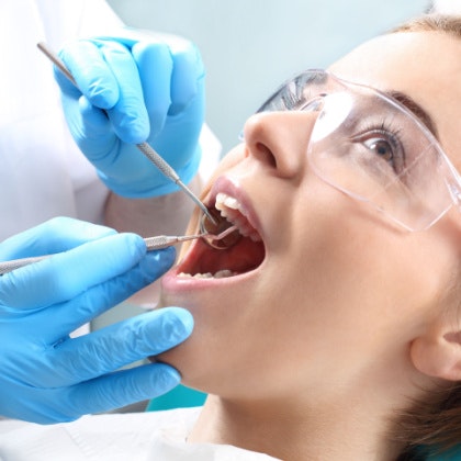 Woman receiving dental checkup