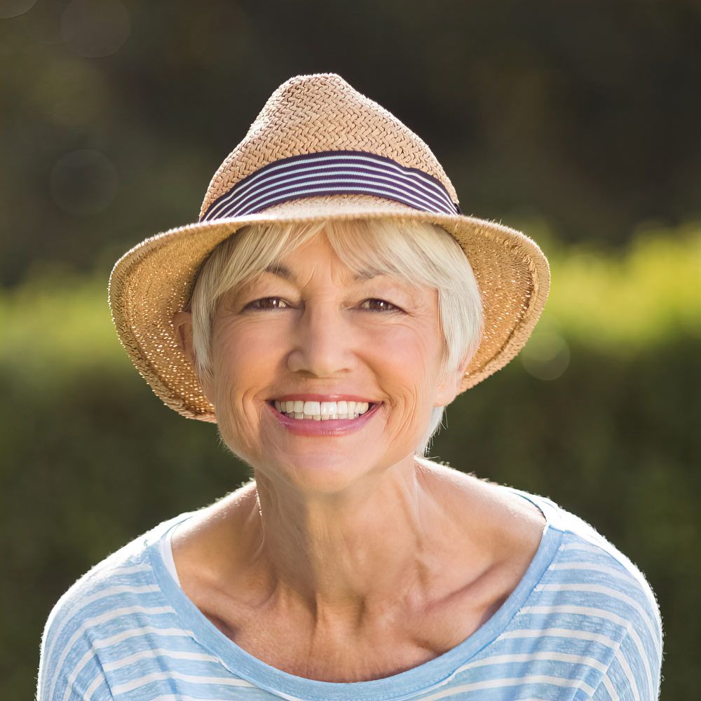 Older woman smiling outdoors