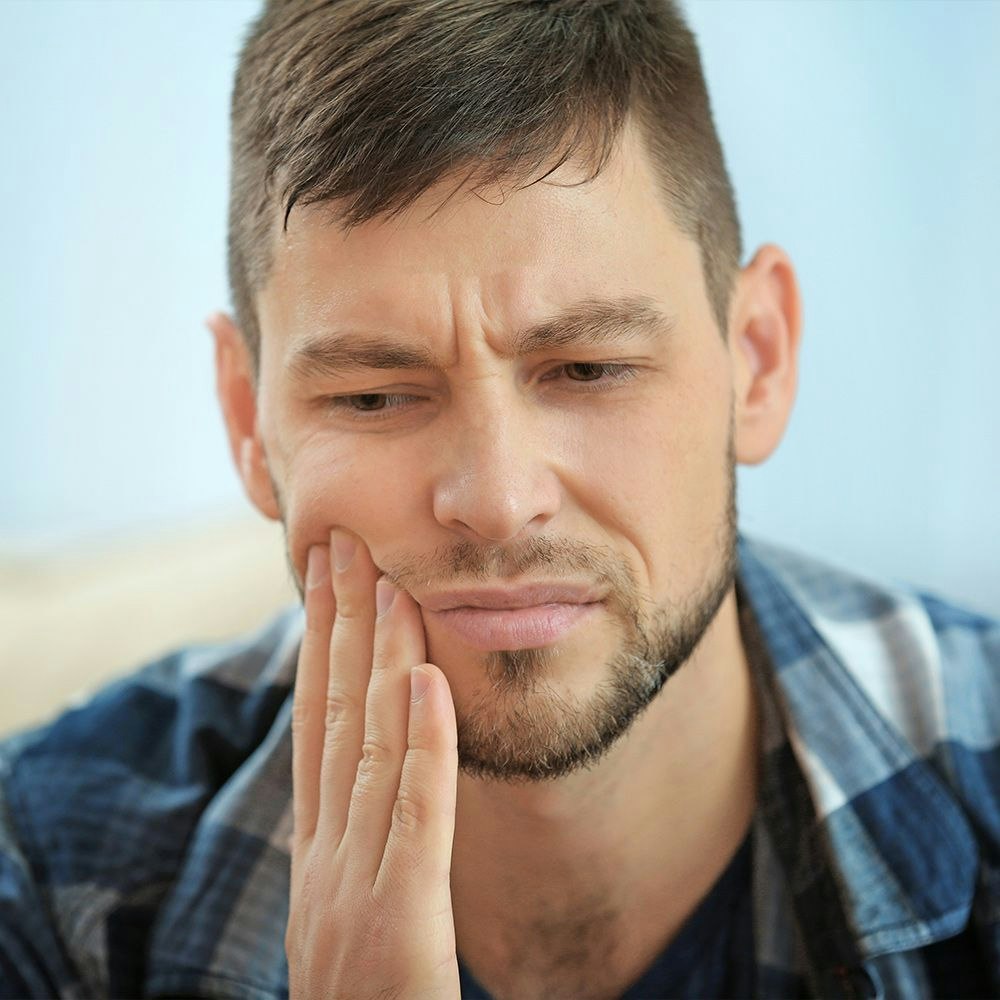 Man with jaw pain