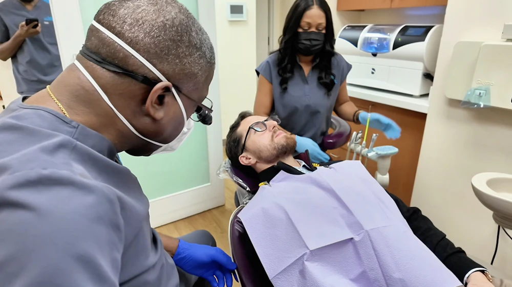 Brooklyn Height Dental team with patient