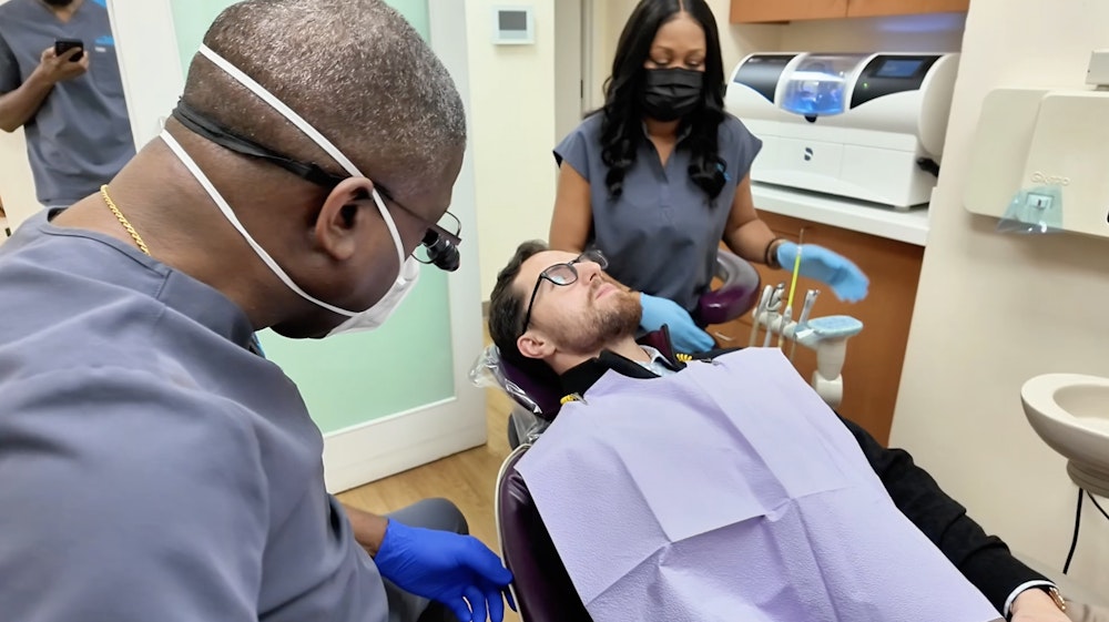 Brooklyn Height Dental team with patient