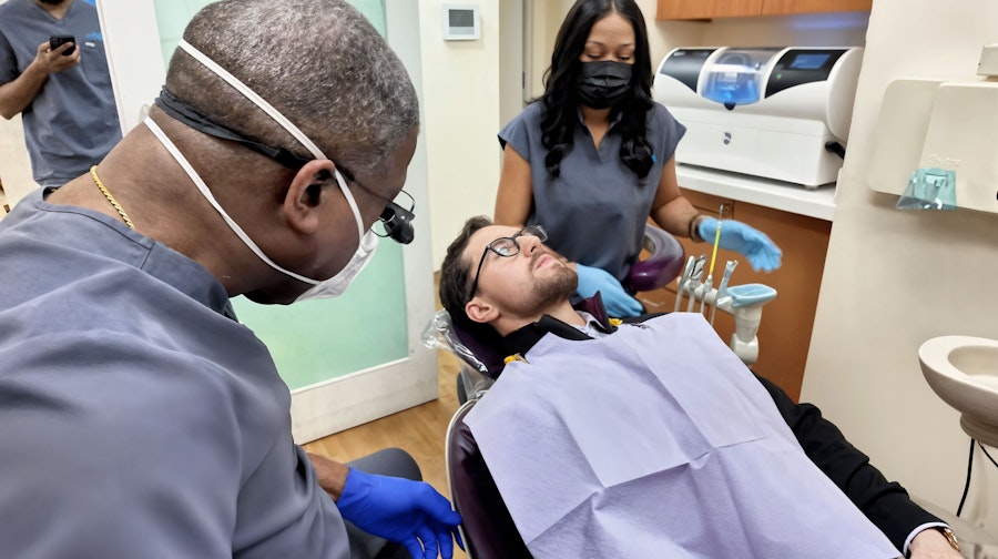 Team at Brooklyn Heights examining a patient