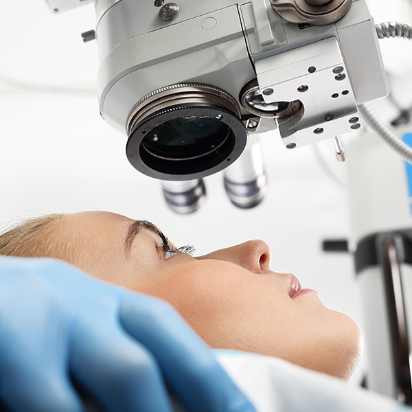 Cornea Crosslinking patient under surgical tool