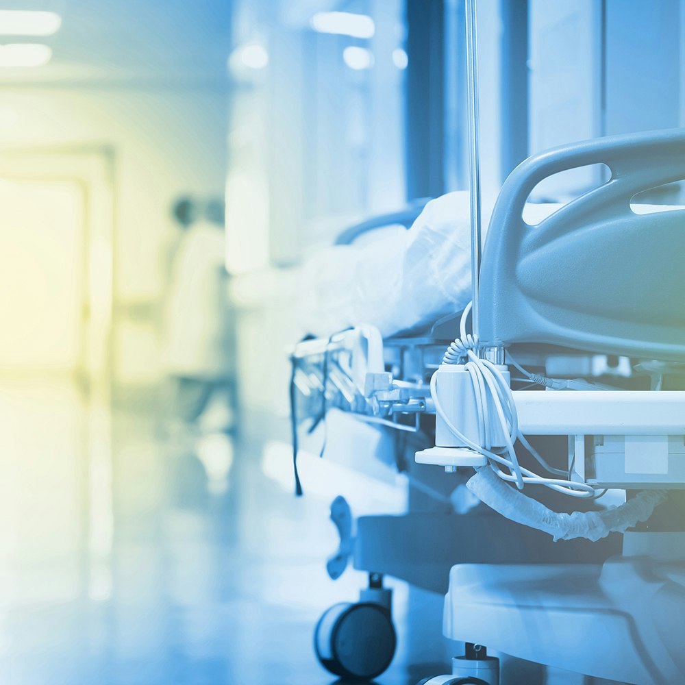 photo of hospital bed in hallway