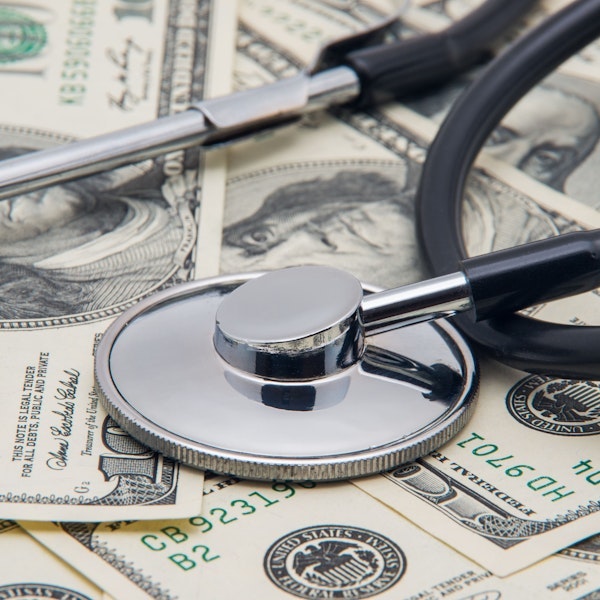 Stethoscope on money
