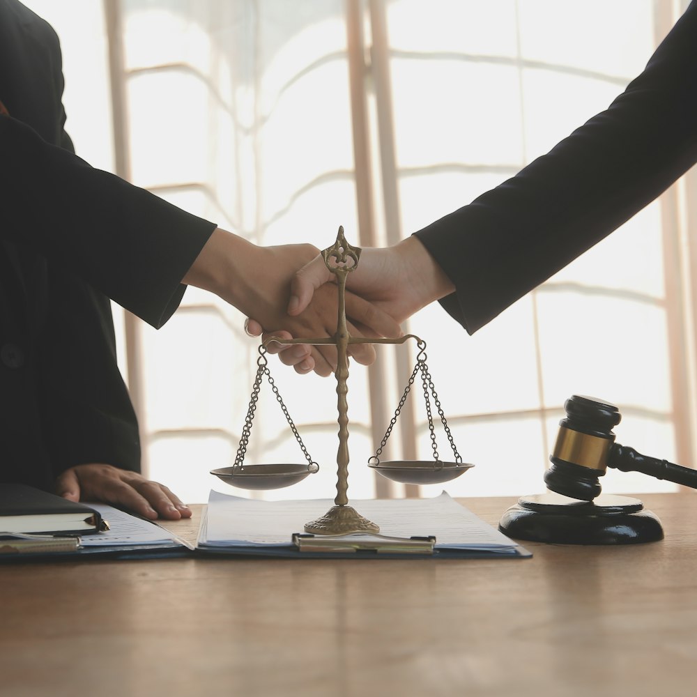 Client shaking hands with lawyer