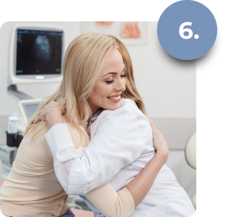 Patient and doctor hugging