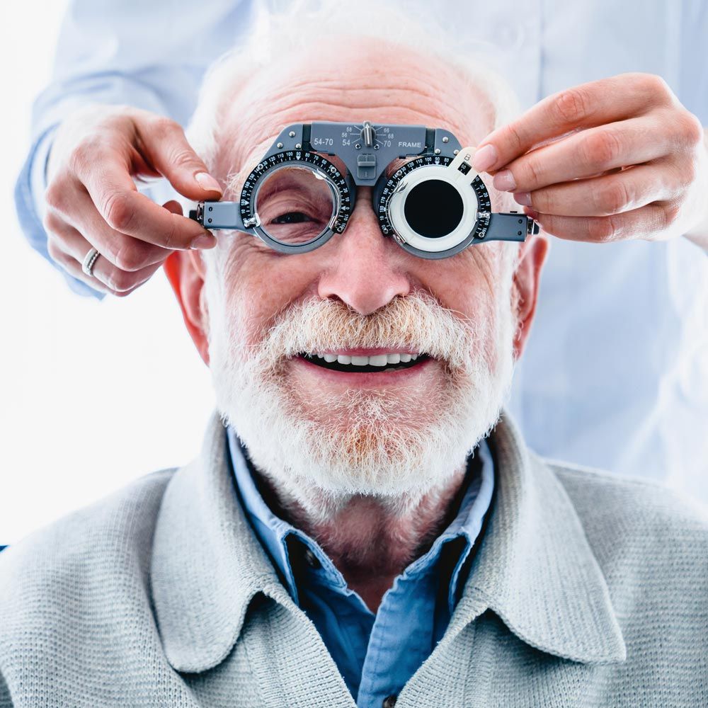 Older patient undergoing eye exam