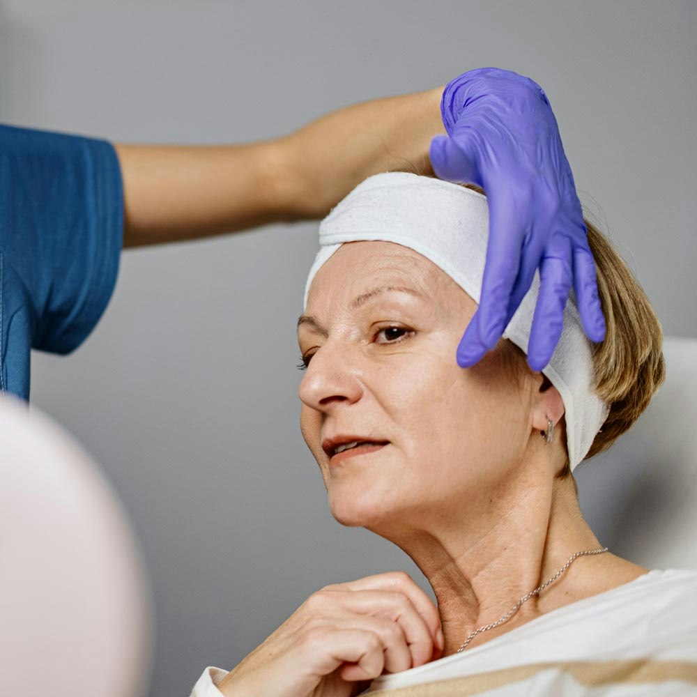 Mature woman with doctor