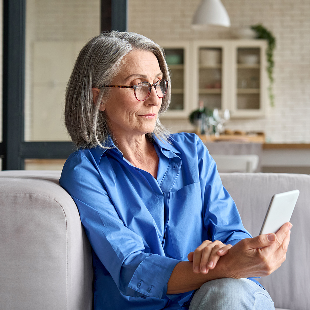 Woman using reading glasses