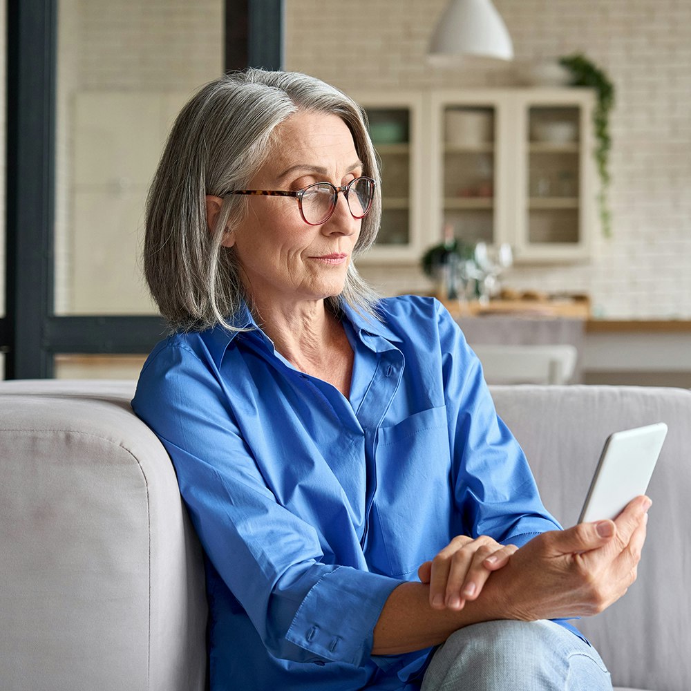 Woman using reading glasses