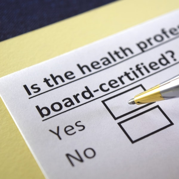 Sheet that asks if the health professional is board-certified with a pen hovered over the yes checkbox