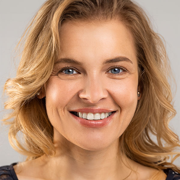 Woman smiling with crow's feet