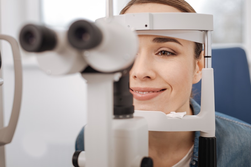 Woman getting an eye exam