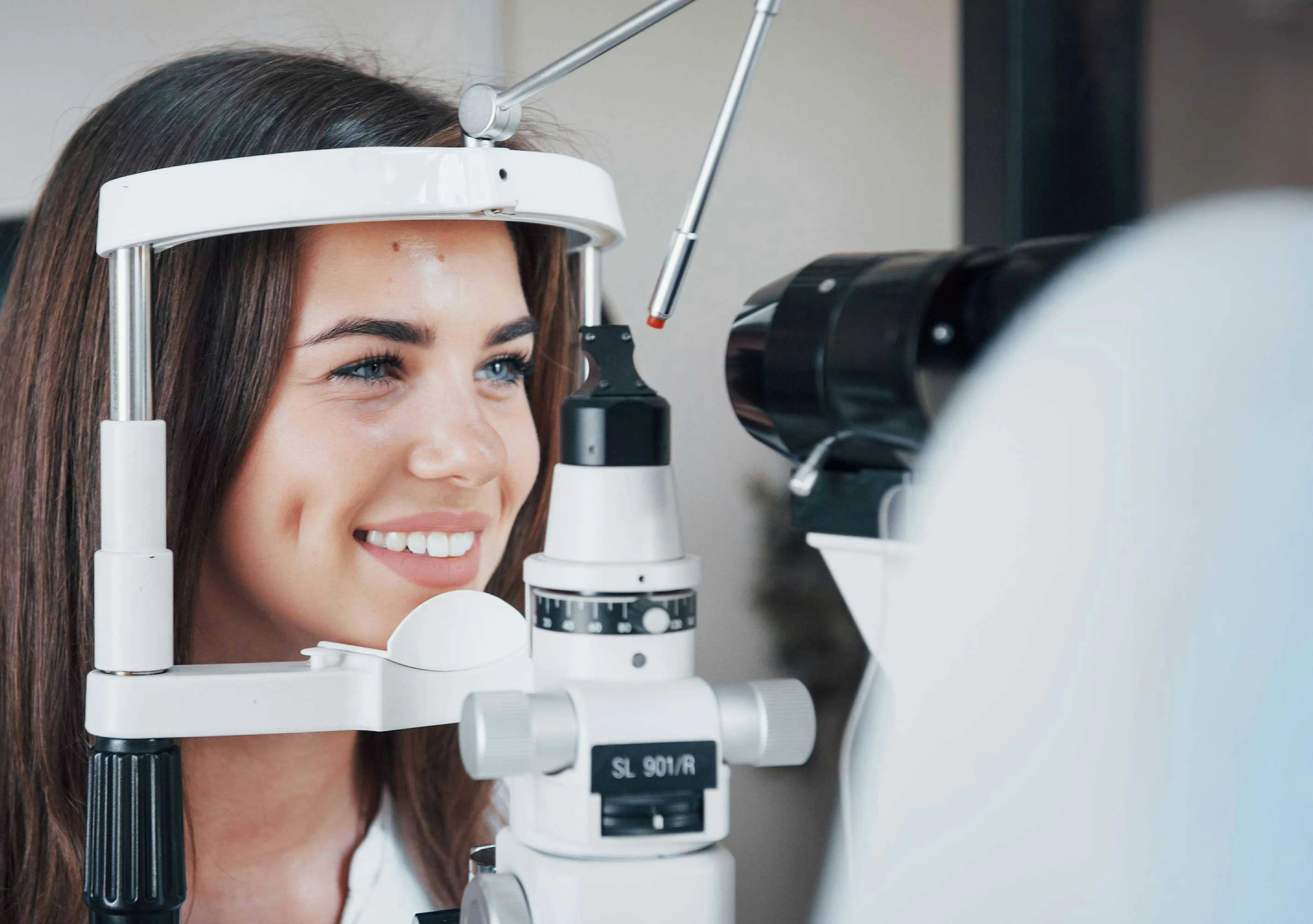 Girl receiving an eye exam