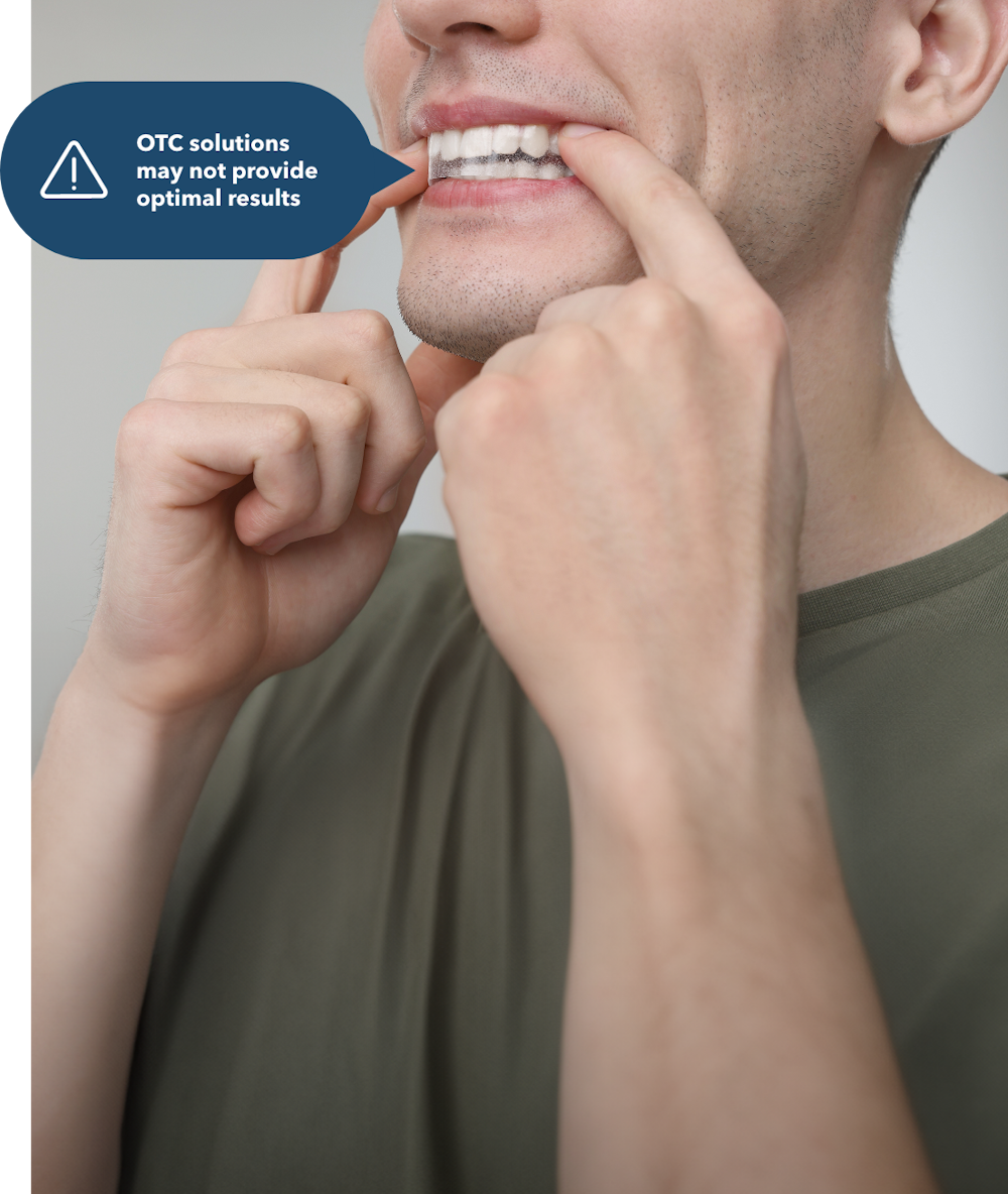 Man applying teeth whitening strip with disclaimer