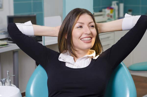 woman with braces smiling