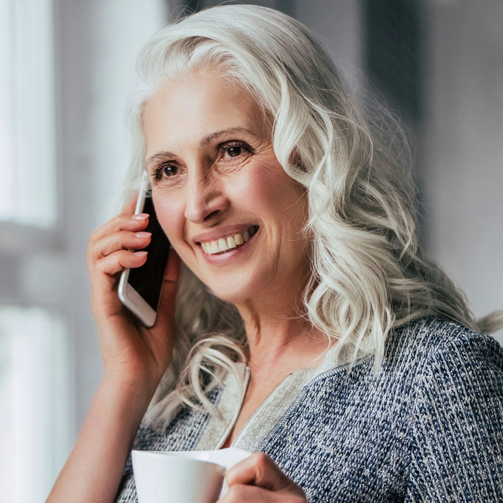 Smiling woman on the phone