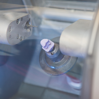 CEREC machine creating a crown