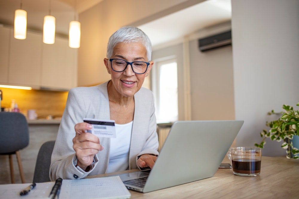 Mature woman making an online payment