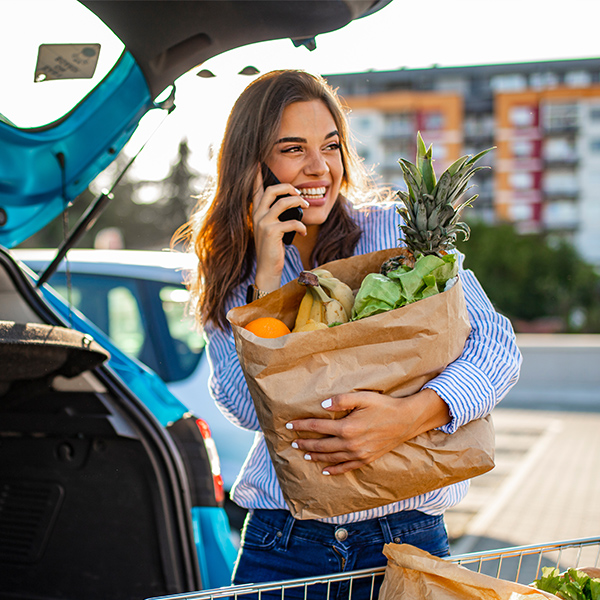 woman carrying groceries
