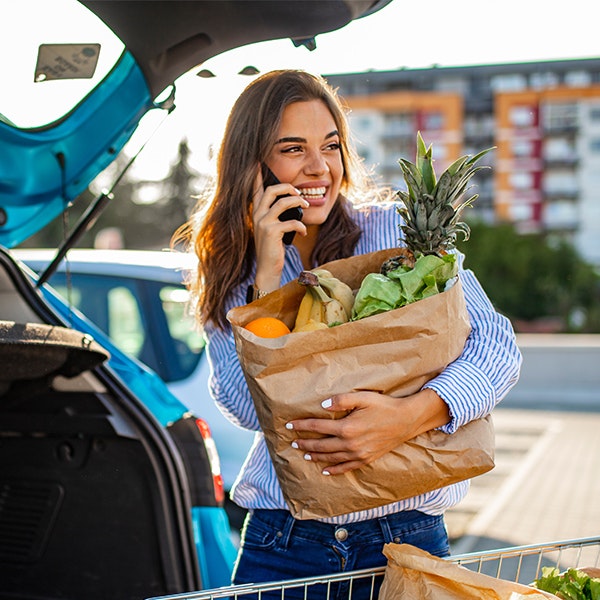 woman carrying groceries