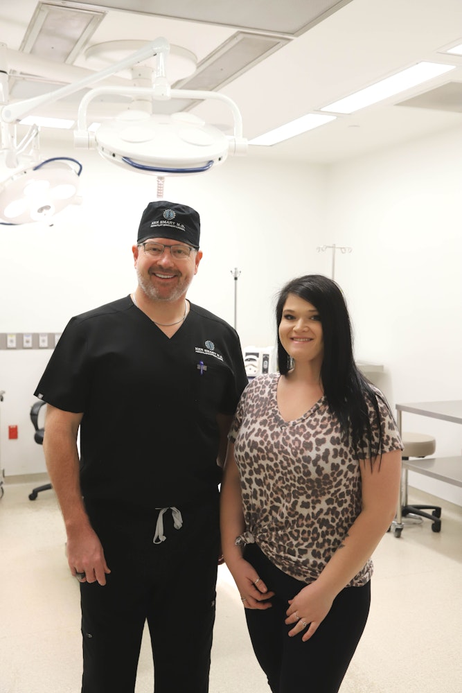 Dr. Ken Smart and patient in surgery facility