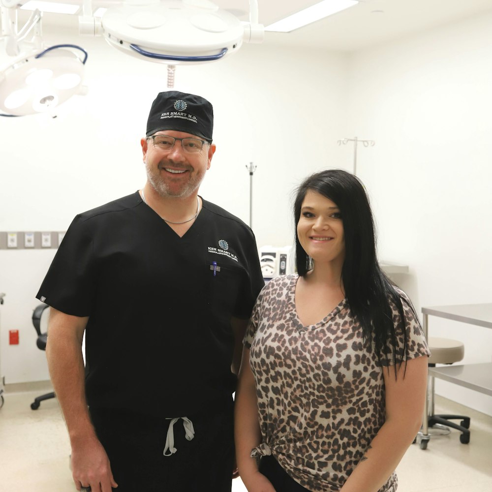 Dr. Ken Smart and patient in surgery facility